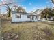 Charming single-story home with a manicured front yard, complemented by black shutters at 1487 Arnold Dr, Lawrenceville, GA 30043