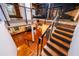 Multi-level interior with exposed brick, hardwood floors, and modern staircase at 342 Marietta Nw St # 8, Atlanta, GA 30313