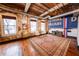 Open living space with exposed brick, wooden floors, and large windows for natural light at 342 Marietta Nw St # 8, Atlanta, GA 30313