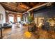 Unique loft-style living room with hardwood floors, exposed brick, and industrial ceiling details at 342 Marietta Nw St # 8, Atlanta, GA 30313