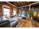 Spacious living room with exposed brick, rustic wood floors, and comfortable seating at 342 Marietta Nw St # 8, Atlanta, GA 30313