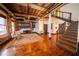 Open living space with vintage sign, exposed brick, and staircase at 342 Marietta Nw St # 8, Atlanta, GA 30313