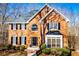 Charming brick home features a well-manicured lawn and a classic design, with black shutters and a gray roof at 3595 Mason Ridge Dr, Winston, GA 30187