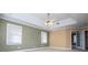 Spacious main bedroom with tray ceilings and a ceiling fan at 3595 Mason Ridge Dr, Winston, GA 30187