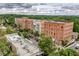 Attractive apartment building and street view with lush trees at 613 Everett Ln, Woodstock, GA 30188