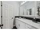 Contemporary bathroom with quartz countertop, sleek cabinetry, and modern mirror at 9135 Etching Overlook, Johns Creek, GA 30097