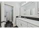 Modern bathroom featuring sleek vanity and a luxurious glass-enclosed shower at 9135 Etching Overlook, Johns Creek, GA 30097