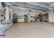 Large three car garage with epoxy floors and tons of storage space at 9135 Etching Overlook, Johns Creek, GA 30097