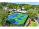 Wonderful community tennis and pickleball courts, plus pool, in a wooded setting near luxury homes at 9135 Etching Overlook, Johns Creek, GA 30097