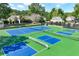Well-maintained tennis and pickleball courts providing a great space for recreation and exercise at 9135 Etching Overlook, Johns Creek, GA 30097