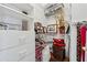 Spacious walk-in closet featuring ample storage and shelving at 9135 Etching Overlook, Johns Creek, GA 30097