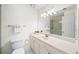 Bright bathroom features a large mirror, vanity with storage, and glass-enclosed shower at 810 Towergate Pl, Atlanta, GA 30350