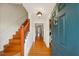 Welcoming entryway featuring hardwood floors and staircase with classic design at 810 Towergate Pl, Atlanta, GA 30350