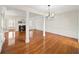 Spacious living room with fireplace, hardwood floors, and an abundance of natural light at 810 Towergate Pl, Atlanta, GA 30350