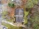 An aerial view of the home's roof, yard, and surrounding landscape at 6664 Windwood Cir, Douglasville, GA 30135