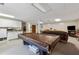 Finished basement features an entertainment area and extra storage space at 6664 Windwood Cir, Douglasville, GA 30135