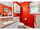 Bright bathroom featuring granite countertop and storage at 6664 Windwood Cir, Douglasville, GA 30135