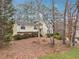 View of home, showing front yard and architectural details at 6664 Windwood Cir, Douglasville, GA 30135
