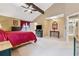 Primary bedroom with vaulted ceiling and en-suite at 6664 Windwood Cir, Douglasville, GA 30135