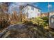 Backyard of a white two-story home with wood stairs at 2381 Highpoint Rd, Snellville, GA 30078