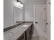 Bathroom features granite countertop, modern vanity, and tile flooring at 2381 Highpoint Rd, Snellville, GA 30078