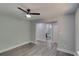 Bedroom featuring wood-look floors and open doorway to the en-suite bathroom at 2381 Highpoint Rd, Snellville, GA 30078