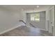 Upstairs hallway featuring wood-look floors and a stairwell with white railings at 2381 Highpoint Rd, Snellville, GA 30078