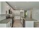 Stylish kitchen with white cabinets, stainless steel appliances, and granite countertops on island at 2381 Highpoint Rd, Snellville, GA 30078