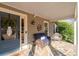 Covered porch with flagstone floor featuring cozy seating and a decorative wreath at 343 Woodstone Dr, Marietta, GA 30068