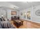 Inviting living room with french doors, hardwood floors, and neutral decor at 343 Woodstone Dr, Marietta, GA 30068