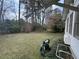 Expansive backyard with a pressure washer, offering ample space for outdoor activities at 1046 Sans Souci Way, Clarkston, GA 30021