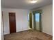 Bedroom with closet and door at 1046 Sans Souci Way, Clarkston, GA 30021