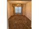 Classic dining room featuring carpet, neutral walls, and a chandelier at 1046 Sans Souci Way, Clarkston, GA 30021