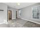 Spacious carpeted bedroom featuring natural light and ensuite access at 4203 Stratford Commons # 4203, Decatur, GA 30033