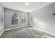 Bright bedroom with two windows and a glass door providing ample natural light at 4203 Stratford Commons # 4203, Decatur, GA 30033