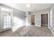 A bedroom with a walk-out patio door and closet at 4203 Stratford Commons # 4203, Decatur, GA 30033