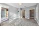 A bedroom with a walk-out patio door and closet at 4203 Stratford Commons # 4203, Decatur, GA 30033
