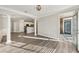 Bright living room and kitchen featuring hardwood floors, stainless appliances, and an open concept layout at 4203 Stratford Commons # 4203, Decatur, GA 30033