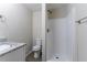Bathroom featuring toilet, shower, and vanity with granite countertop at 645 Plainville Sw Dr, Atlanta, GA 30331