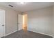 Cozy bedroom featuring fresh neutral paint and plush gray carpet at 645 Plainville Sw Dr, Atlanta, GA 30331