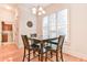 Cozy dining area with natural light and seating for four at 2685 Lenora Church Rd, Snellville, GA 30078