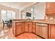 Open-concept kitchen includes stainless steel appliances, granite countertops, and hardwood floors at 2685 Lenora Church Rd, Snellville, GA 30078