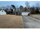 Charming brick home with a two-car garage and well-maintained landscaping at 310 Creekside Trl, Covington, GA 30016