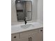 Bathroom features modern vanity with rectangular sink and updated black hardware at 3112 Cloverhurst Dr, Atlanta, GA 30344