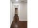 Hallway with freshly painted walls and hardwood floors at 3112 Cloverhurst Dr, Atlanta, GA 30344