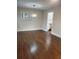 Bright living room with hardwood floors that leads to a white kitchen at 3112 Cloverhurst Dr, Atlanta, GA 30344