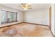 Bedroom with window, ceiling fan, and natural light at 2541 Deer Isle Cv, Lawrenceville, GA 30044