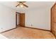 Bedroom with ceiling fan, natural light, and closet at 2541 Deer Isle Cv, Lawrenceville, GA 30044