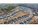 An aerial view of a community featuring new single-Gathering homes and landscaping at 335 Tillman Pass, Woodstock, GA 30188