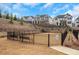 Community dog park with benches, fencing, and landscaping at 335 Tillman Pass, Woodstock, GA 30188